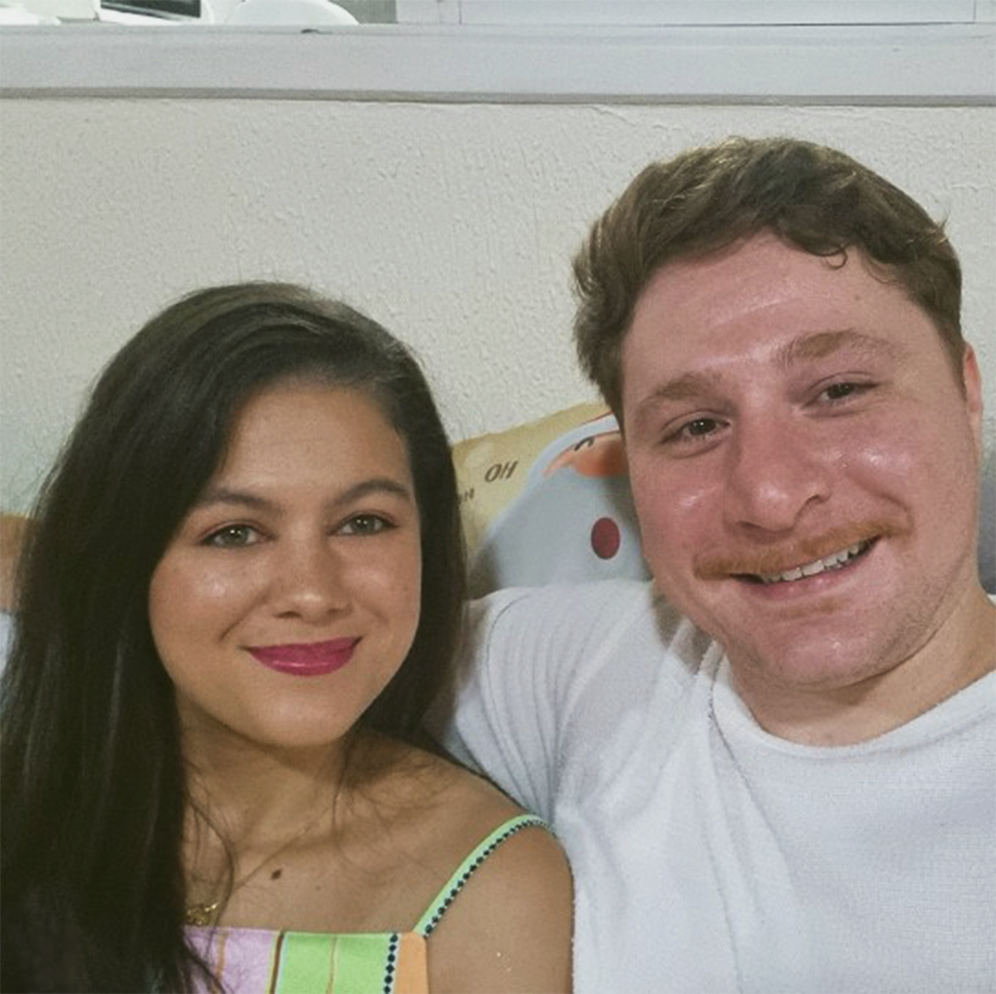 Papai e mamãe esperando pelo bebê